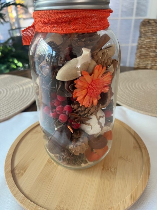 Aroma jar showcasing vibrant colors from a different angle.