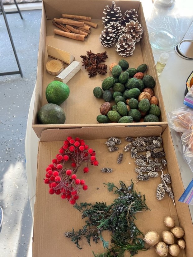 Selected items for the Christmas-themed aroma jar, organized for assembly.