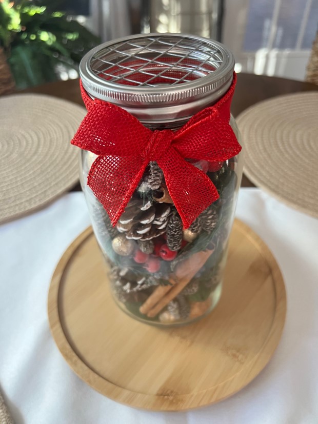 Various completed aroma jars displaying different designs and themes.